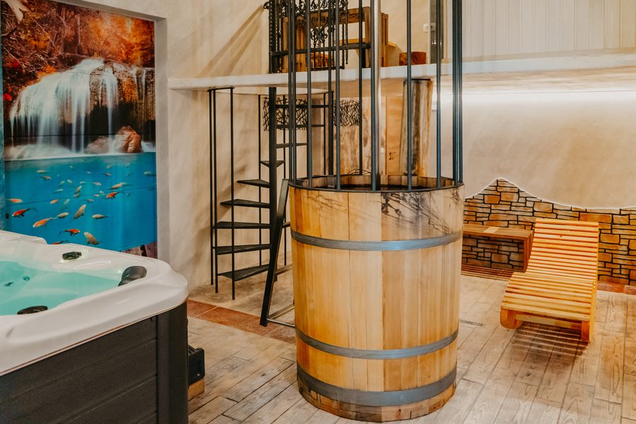 Wellness corner with sauna and wood panelling.
